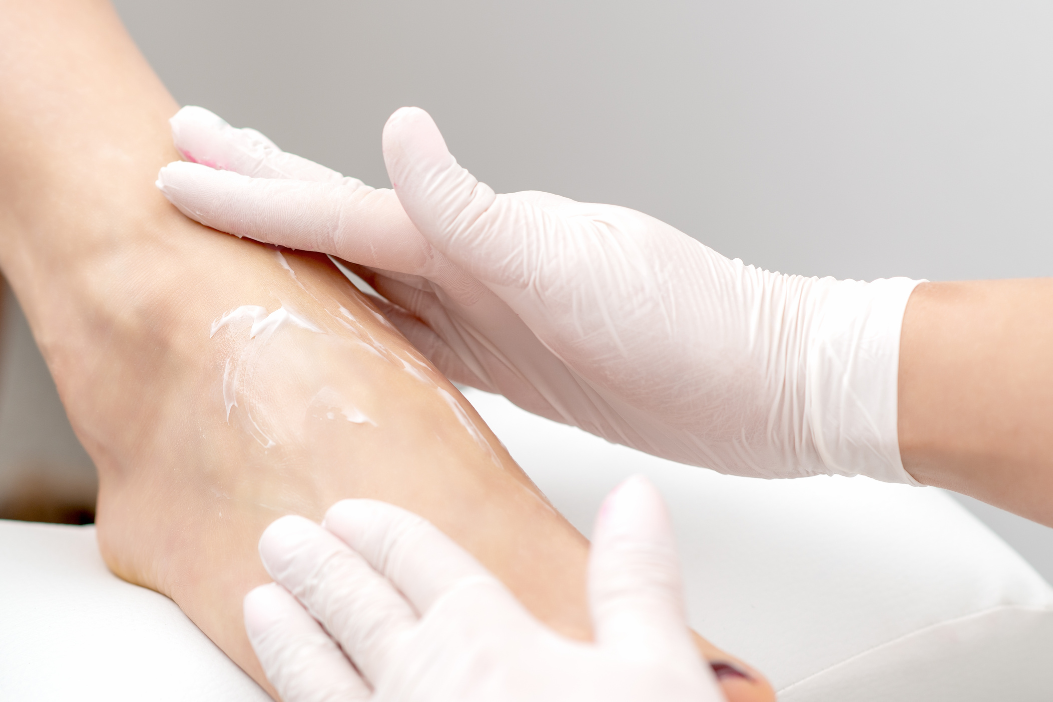 Foot massage with peeling cream.